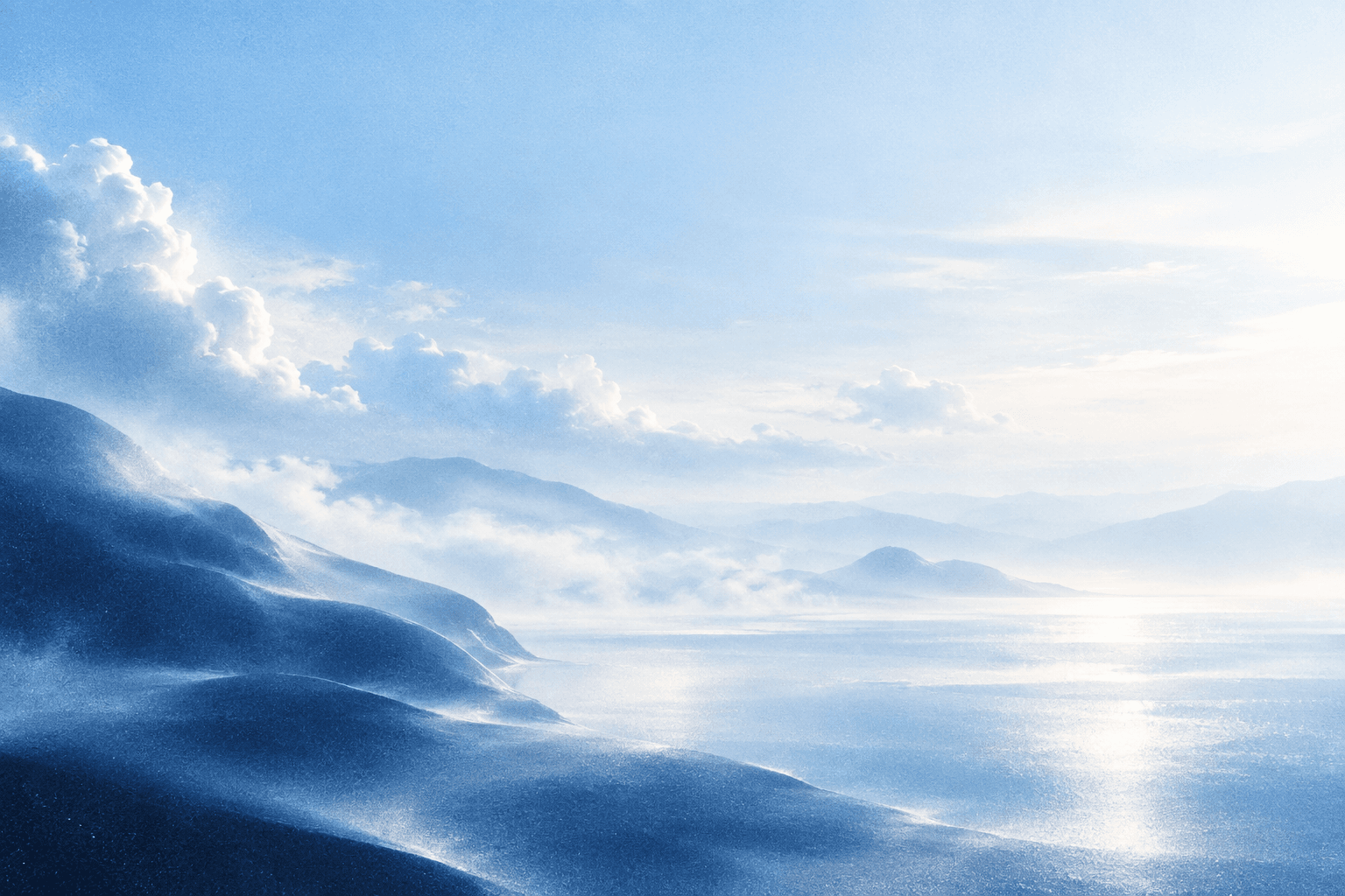 A grainy blue mountain landscape fading into a bright horizon